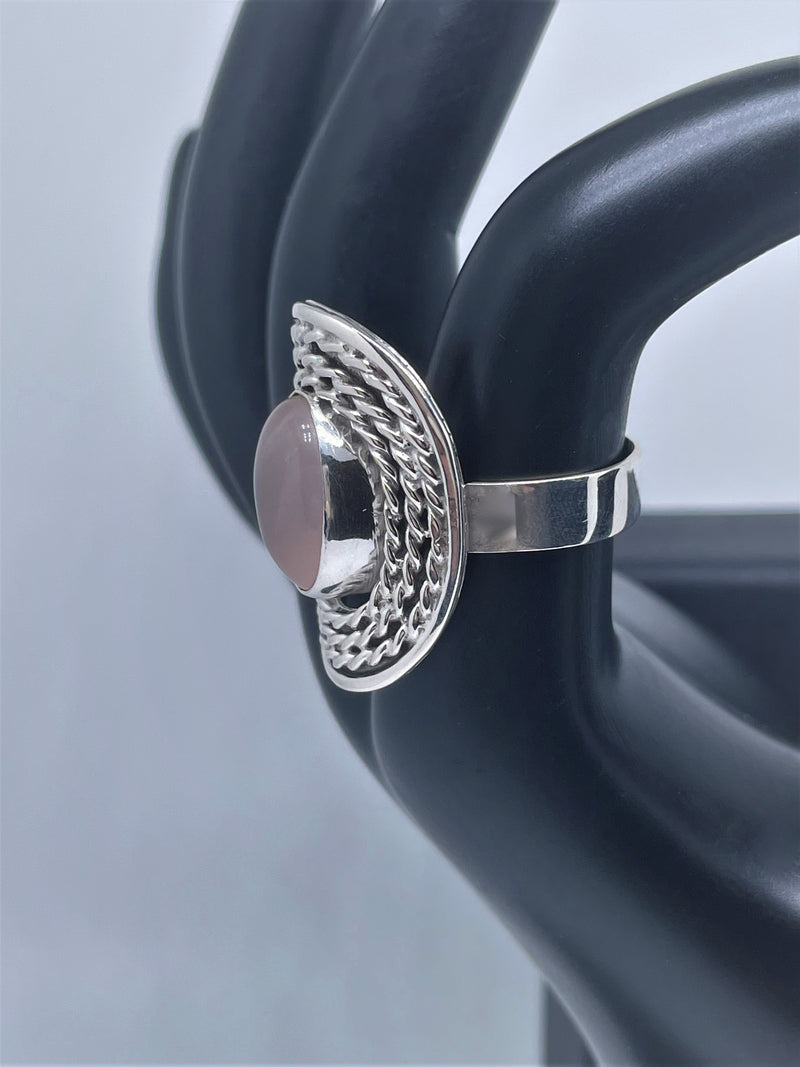 Oval doted silver ring with amethyst or pink quartz crystal stone