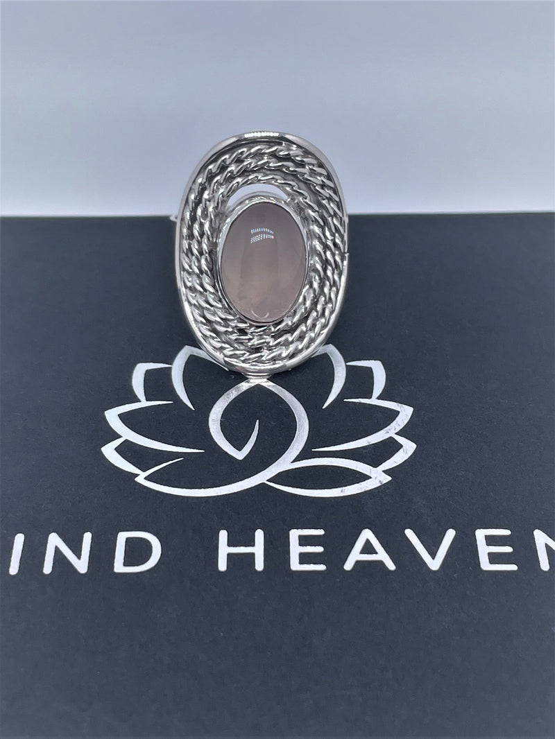 Oval doted silver ring with amethyst or pink quartz crystal stone