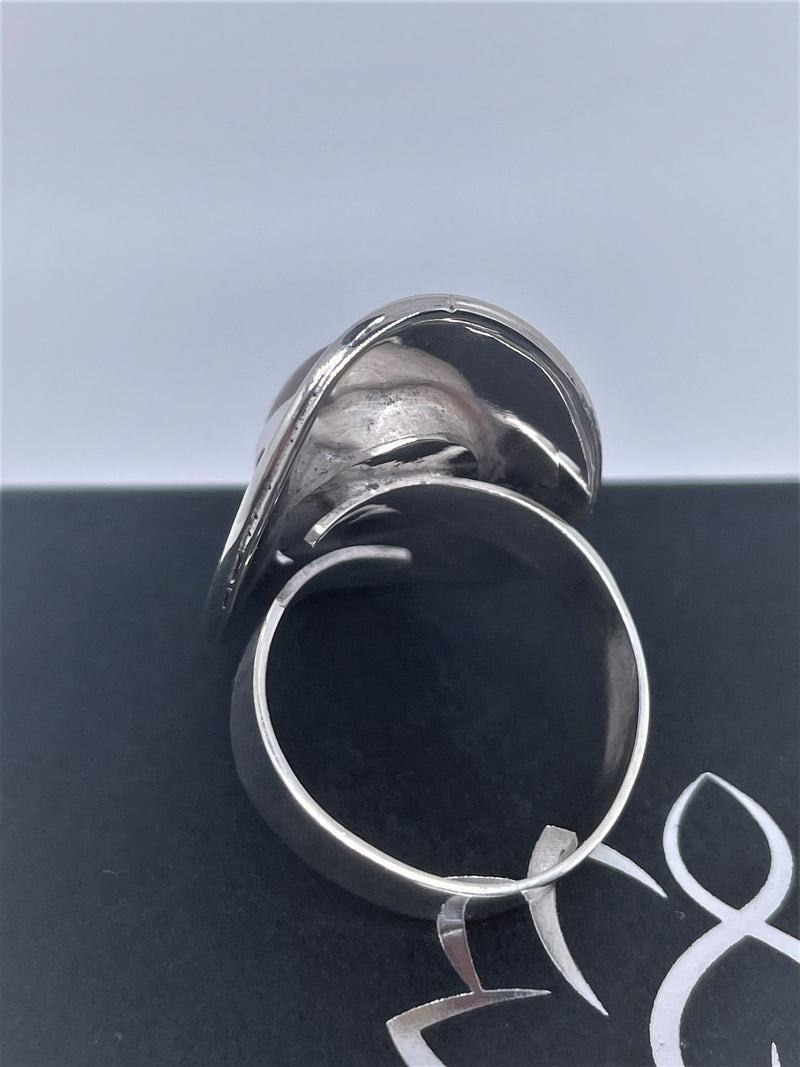 Oval doted silver ring with amethyst or pink quartz crystal stone