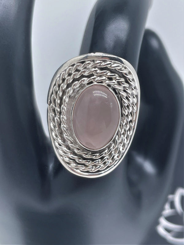 Oval doted silver ring with amethyst or pink quartz crystal stone