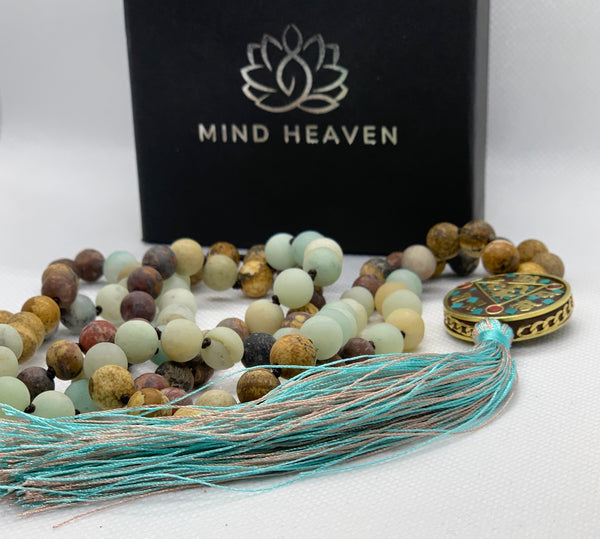 Nepal beads featuring Picasso Jasper and Amazonite stones beads 108 Hand made mala necklace with Hum tassel in aqua colors.