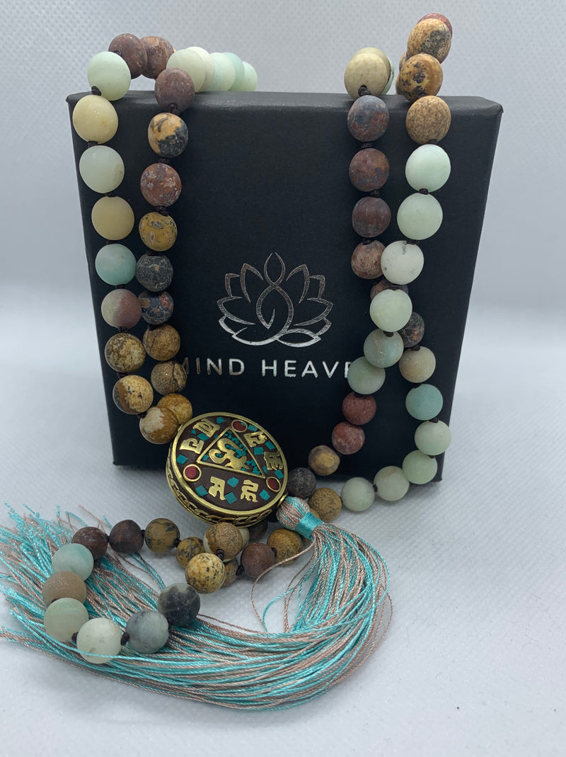 Nepal beads featuring Picasso Jasper and Amazonite stones beads 108 Hand made mala necklace with Hum tassel in aqua colors.