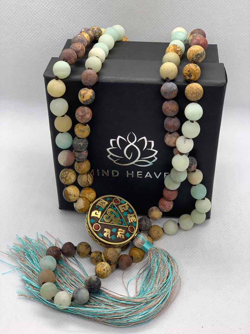 Nepal beads featuring Picasso Jasper and Amazonite stones beads 108 Hand made mala necklace with Hum tassel in aqua colors.