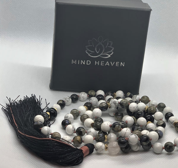 "Mynd-Intuition" beautiful and unique 108 hand-made mala necklace features gray opal and white turquoise with one round rose quartz as marker bead with black tassel and pink-colored knotted threads.