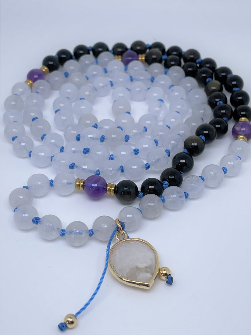Black Onyx, Moonstone, and Amethyst  Beads with moonstone pendant and blue string