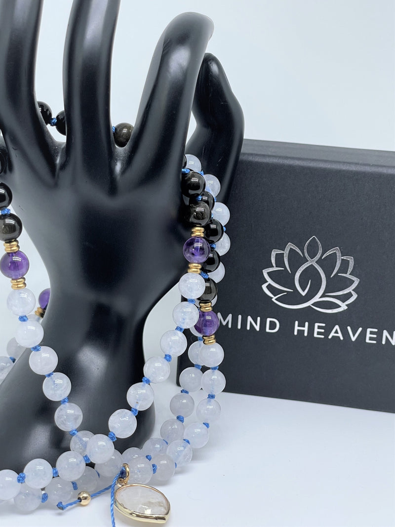 Black Onyx, Moonstone, and Amethyst  Beads with moonstone pendant and blue string