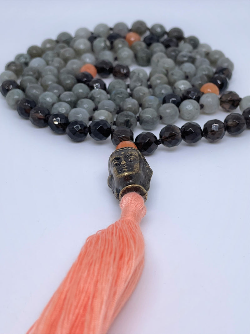 Necklace features Labradorite, Smoky Quartz and sunstone with Buddha face as guru pendant and orange tassel