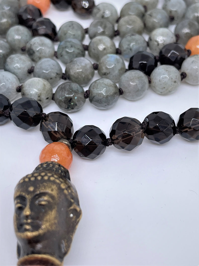 Necklace features Labradorite, Smoky Quartz and sunstone with Buddha face as guru pendant and orange tassel