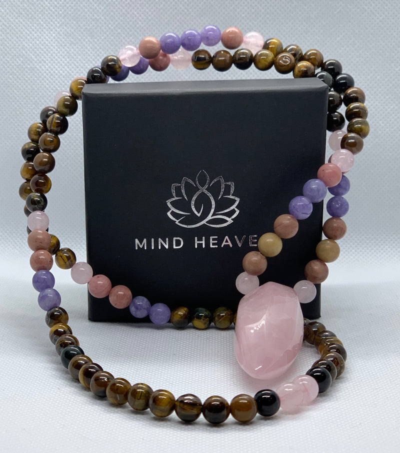 Beautiful Mala 108 hand-made Necklace features Tiger's Eye Rhodonite and Aquamarine beads, with Pink Quartz pendant