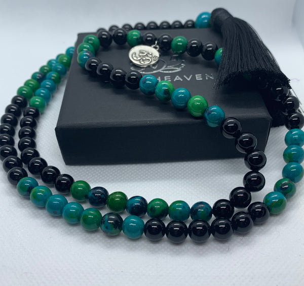 Elegant Black Onyx and Chrysocolla 108 Mala Necklace with black tassel and OM pendant.   This beautiful 108 hand-made mala necklace features Black Onyx and Chrysocolla Beads with black tassel and OM pendant