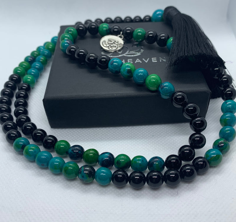 Elegant Black Onyx and Chrysocolla 108 Mala Necklace with black tassel and OM pendant.   This beautiful 108 hand-made mala necklace features Black Onyx and Chrysocolla Beads with black tassel and OM pendant