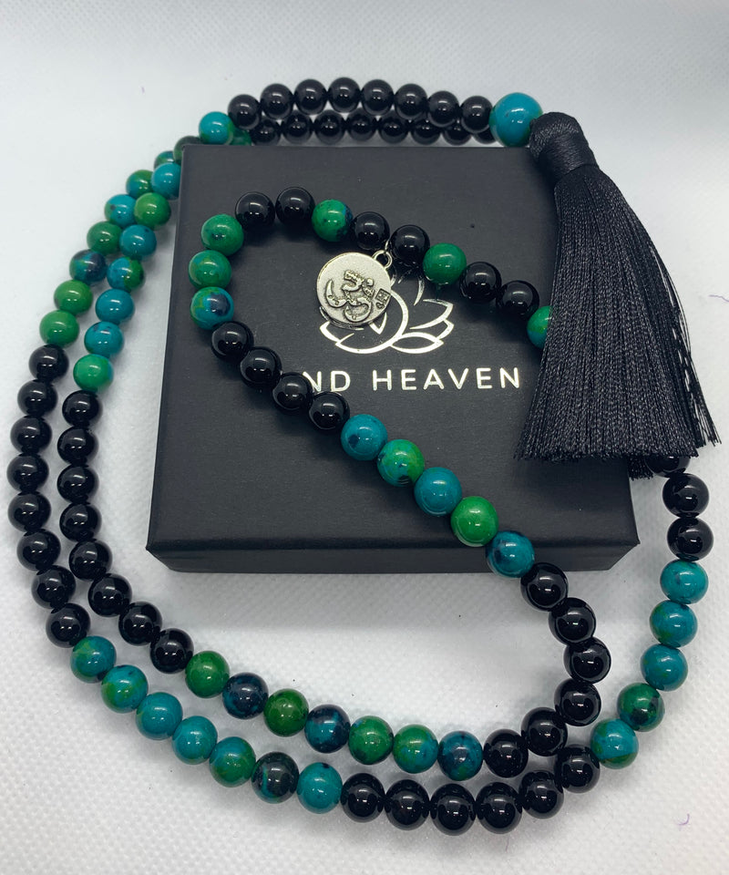 Elegant Black Onyx and Chrysocolla 108 Mala Necklace with black tassel and OM pendant.   This beautiful 108 hand-made mala necklace features Black Onyx and Chrysocolla Beads with black tassel and OM pendant