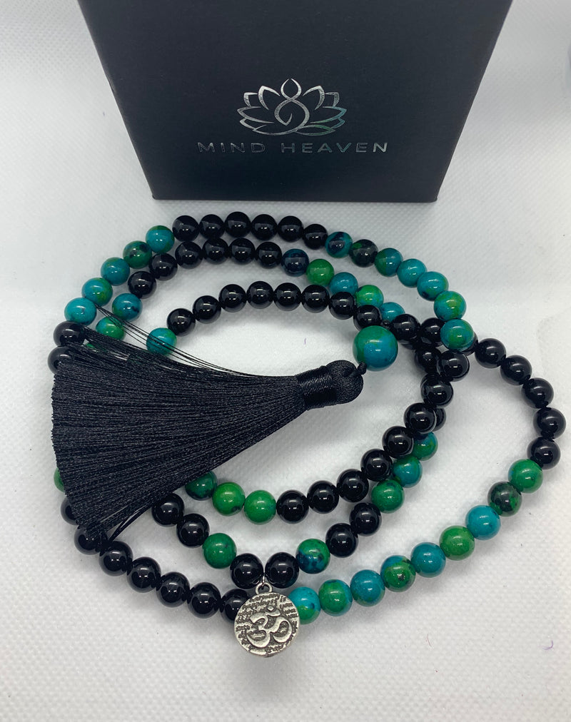Elegant Black Onyx and Chrysocolla 108 Mala Necklace with black tassel and OM pendant.   This beautiful 108 hand-made mala necklace features Black Onyx and Chrysocolla Beads with black tassel and OM pendant