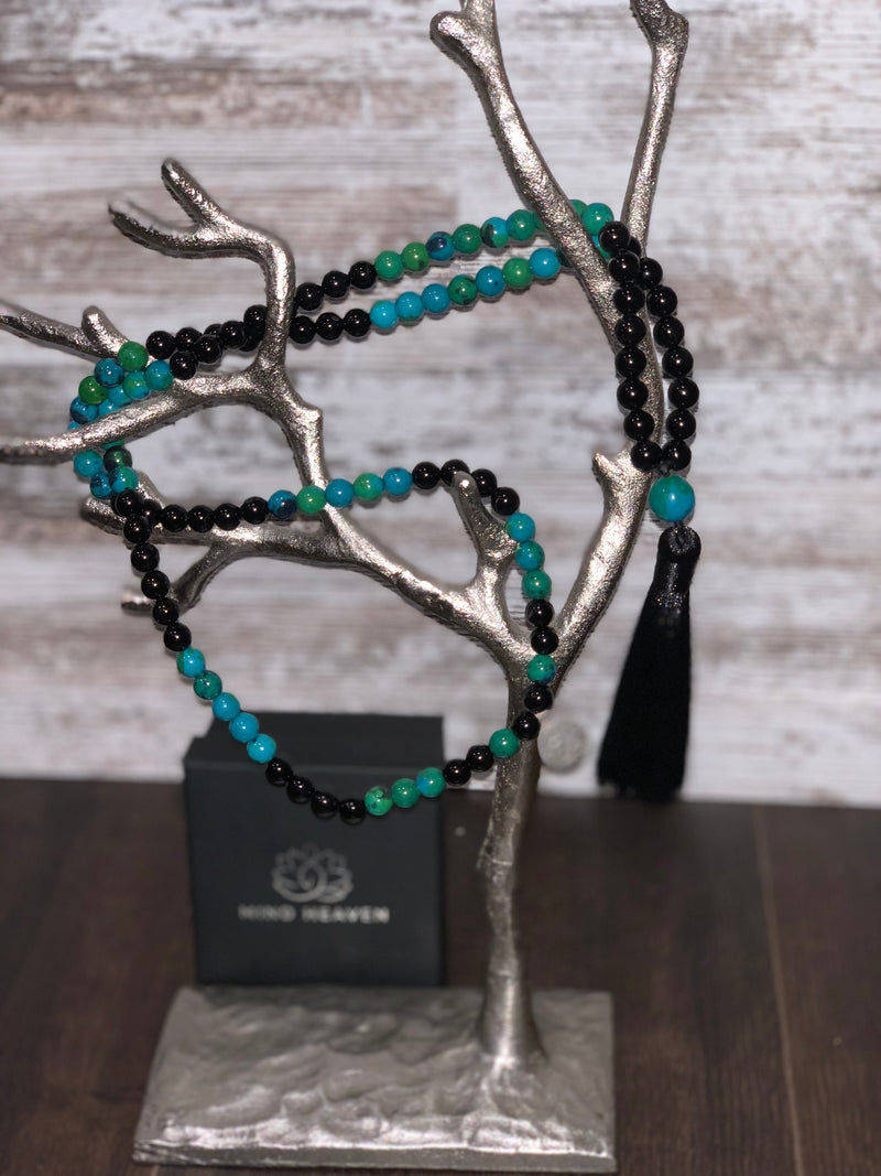 Elegant Black Onyx and Chrysocolla 108 Mala Necklace with black tassel and OM pendant.   This beautiful 108 hand-made mala necklace features Black Onyx and Chrysocolla Beads with black tassel and OM pendant