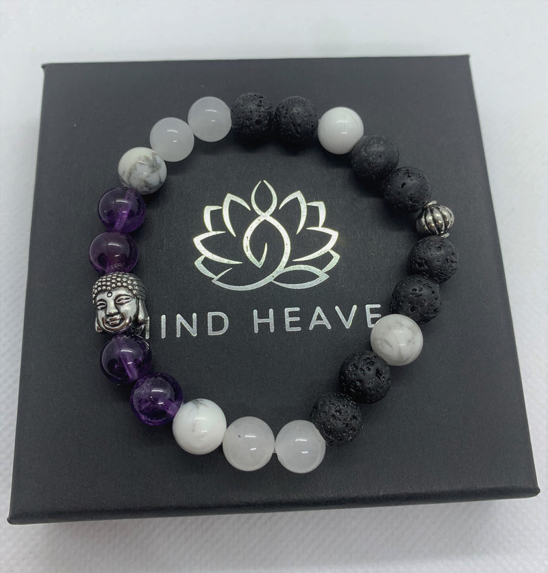 "Purple-love" wrist mala Is an Elegant Hand-Made bracelet that features Amethyst, Howlite, pink quartz, and lava beads with Buddha's face.