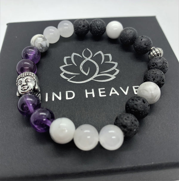 "Purple-love" wrist mala Is an Elegant Hand-Made bracelet that features Amethyst, Howlite, pink quartz, and lava beads with Buddha's face.