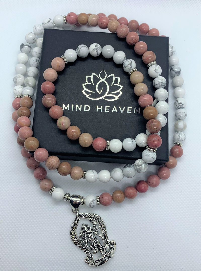 "Mynd-Inspiration" is a Stunning and elegant 108 hand-made mala necklace features black and white snowflakes with a Ganesha pendant. Bracelet