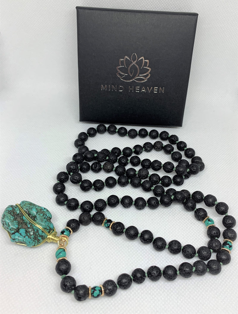 “Mynd-Clear” This exclusive 108 hand-made mala beads necklace features Lava stone beads and a beautiful and unique Turquoise pendant.