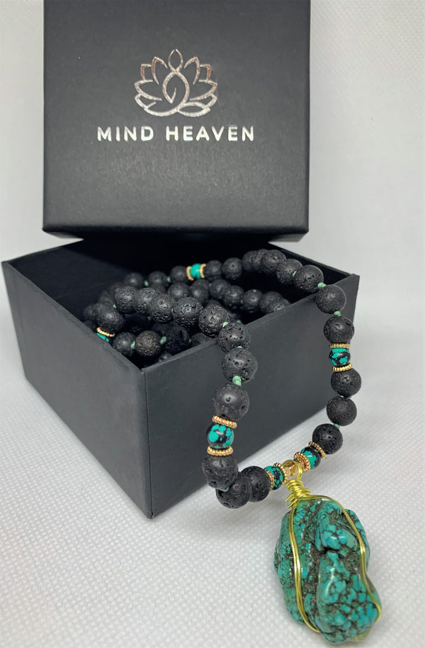 “Mynd-Clear” This exclusive 108 hand-made mala beads necklace features Lava stone beads and a beautiful and unique Turquoise pendant.