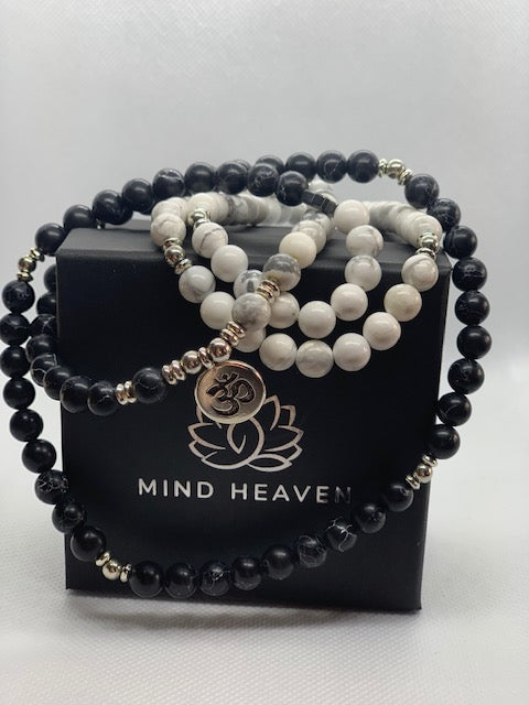 "Mynd-Emotion" Is an Elegant Hand-Made 108 Mala beads that feature White Turquoise and Black Sea sediment Jasper beads with OM pendant / necklace or bracelet