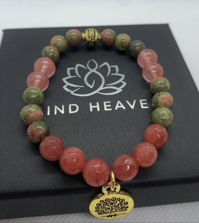 "Sandia-me" wrist mala Is an elegant and colorful Hand-Made bracelet that features Unakite and Watermelon Tourmaline gemstones beads with a lotus golden pendant.