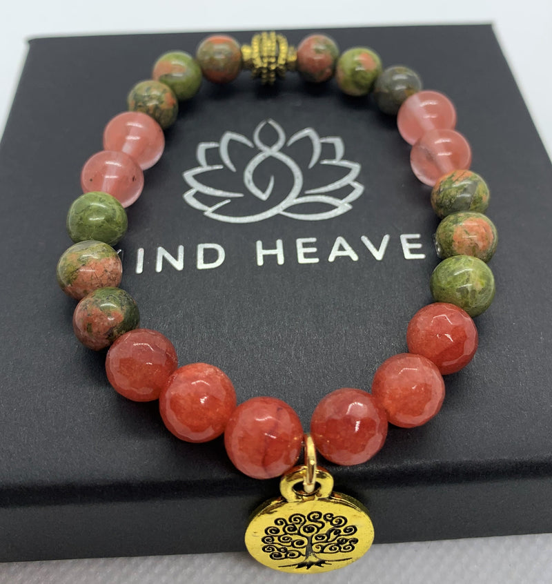 "Sandia-me" wrist mala Is an elegant and colorful Hand-Made bracelet that features Unakite and Watermelon Tourmaline gemstones beads with a lotus golden pendant