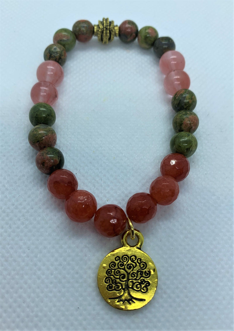 "Sandia-me" wrist mala Is an elegant and colorful Hand-Made bracelet that features Unakite and Watermelon Tourmaline gemstones beads with a lotus golden pendant