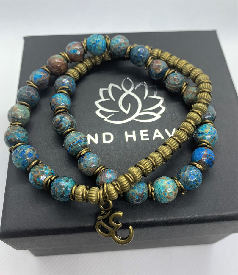 "Love-me" wrist mala Is an Elegant Hand-Made bracelet that features Ocean Jasper beads with OM pendant.